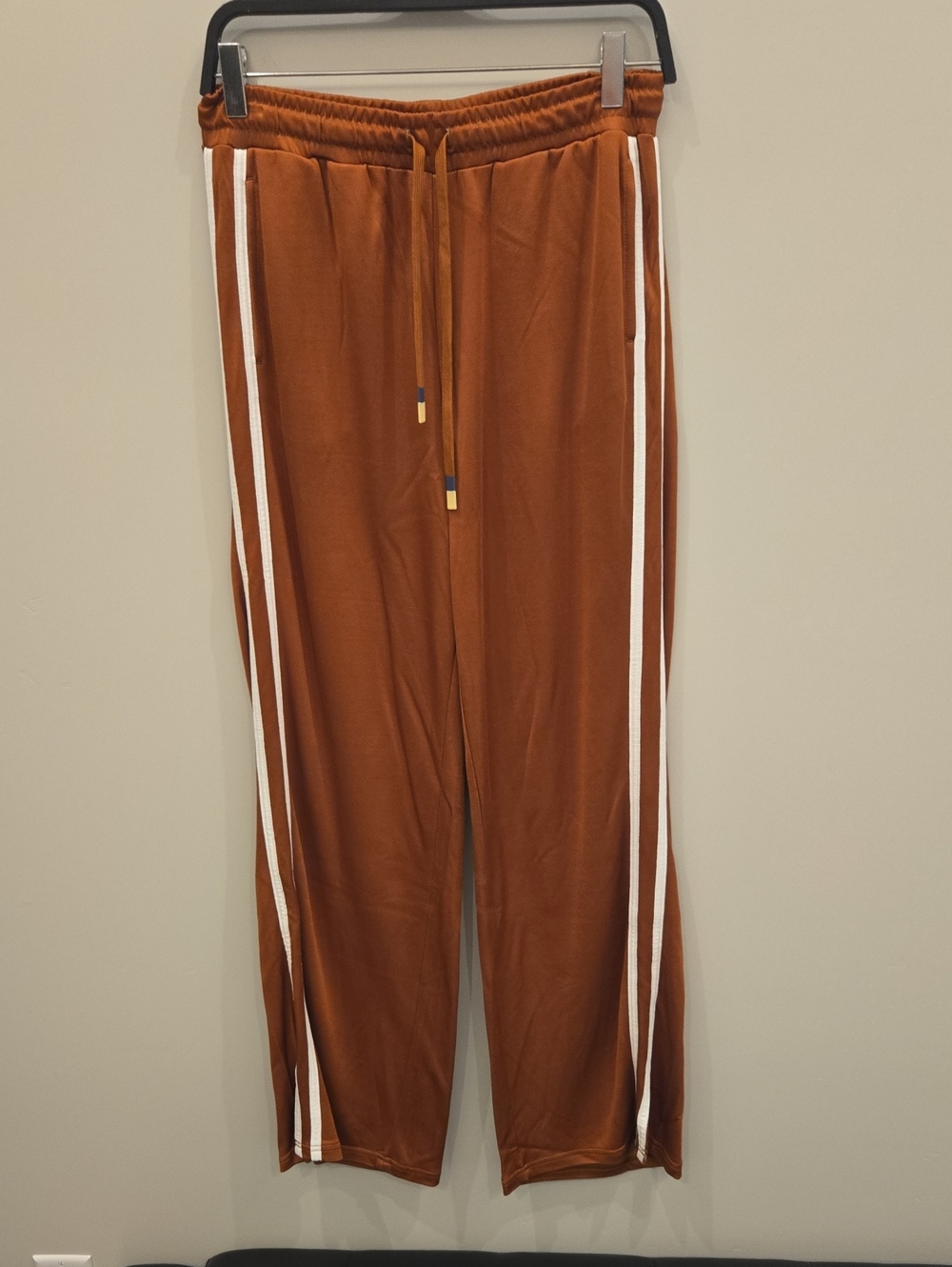 NWT Women's The Upside Rust Brown Joggers with White Side Stripes. Size Small.